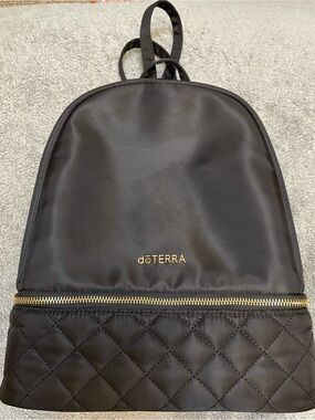Doterra Black Quilted-Bottom Backpack with Gold Accents